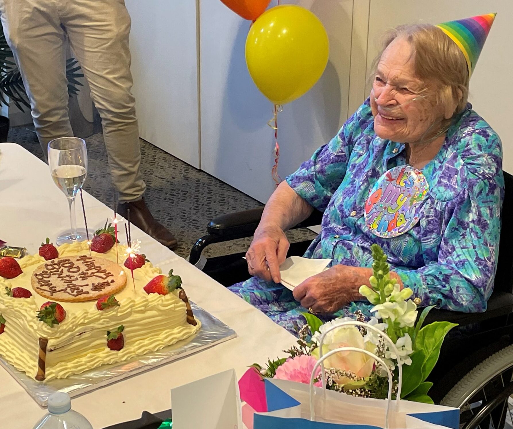 Warrigal resident celebrating a birthday with friends and staff.