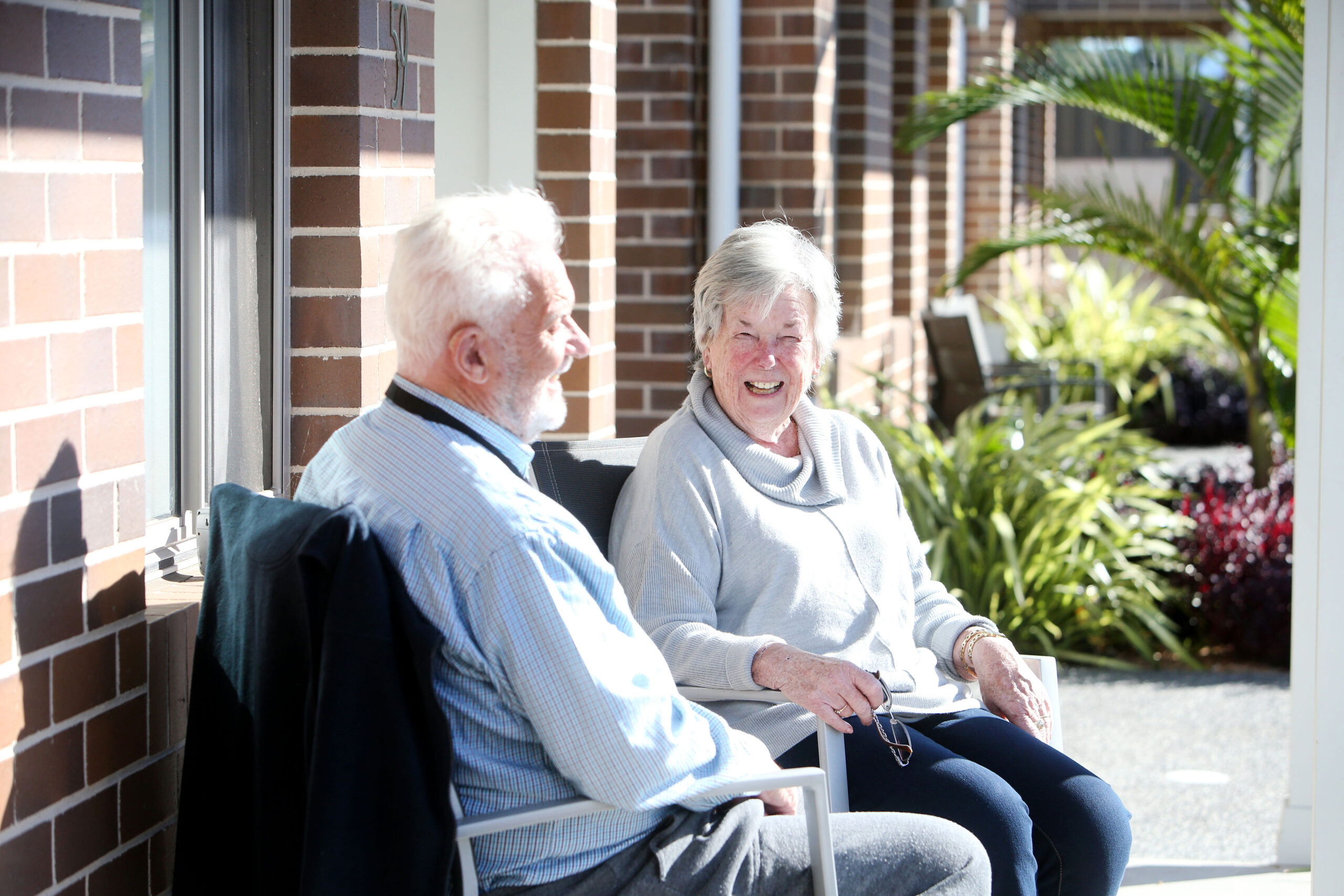 Residents sharing joyful smiles in a heart-warming moment.