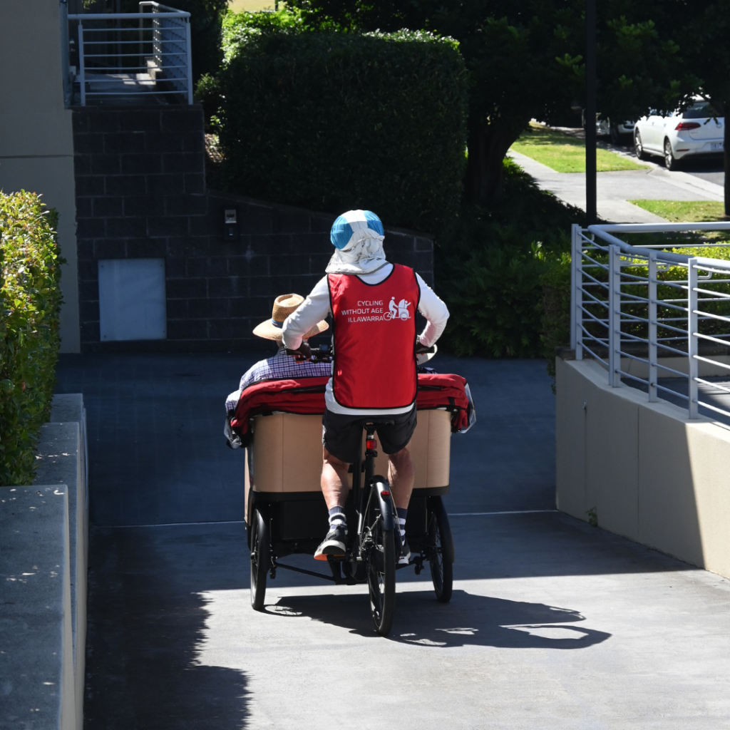 Residents on board trishaw bike at Warrigal Wollongong